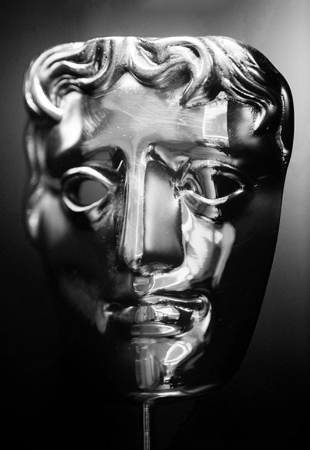 Silver mask sculpture